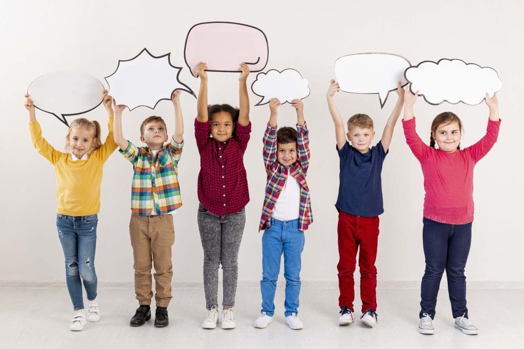 childrens holding chat bubbles